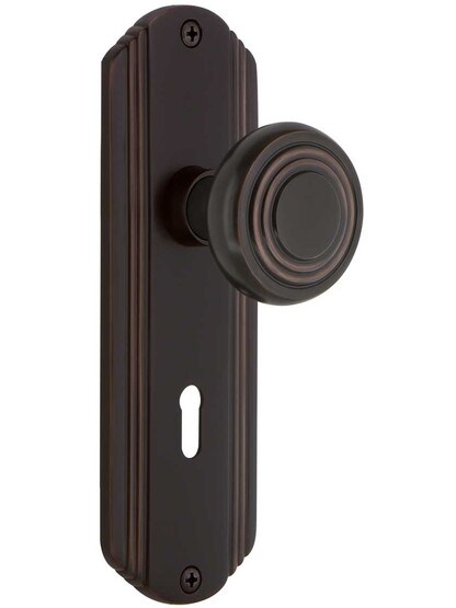 Streamline Deco Door Set with Matching Knobs and Keyhole in Timeless Bronze.
